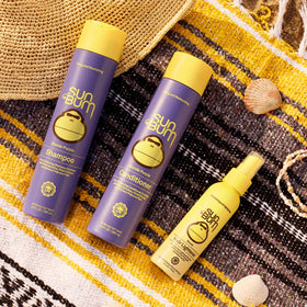 Sun Bum ingredients display with pineapple and Meyer lemon for natural brightening