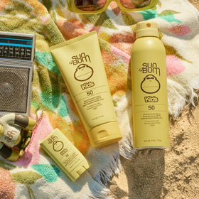 Sun Bum clear sunscreen texture on arm demonstrating no white cast benefit