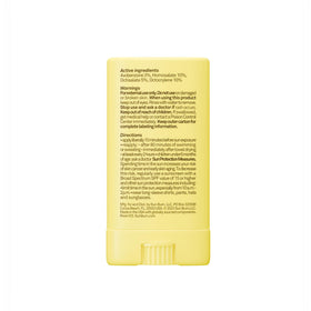 Sun Bum kids face stick in a beach scene with child for sun protection on play days