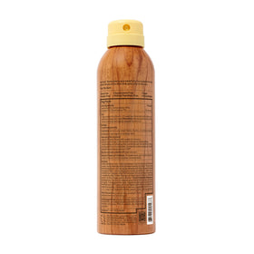 Sun Bum applied at the beach illustrating easy reapplication and reef-friendly formula