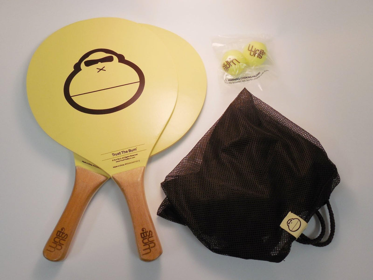 Close-up of Sun Bum wooden paddle handle with engraved logo for a durable grip
