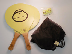 Close-up of Sun Bum wooden paddle handle with engraved logo for a durable grip