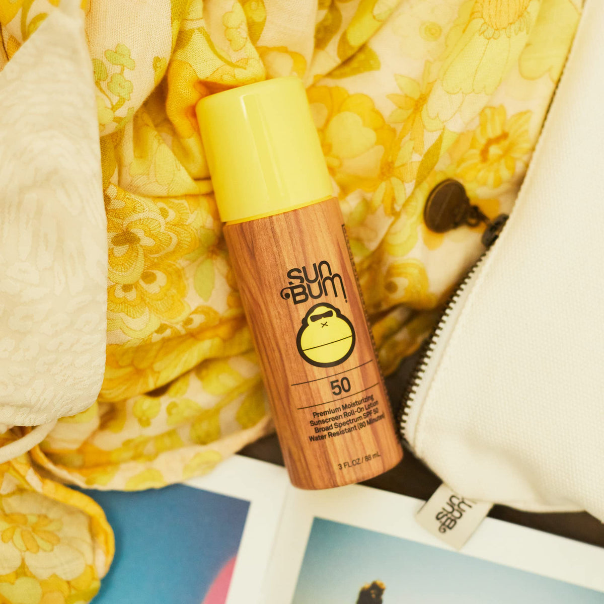 Close-up of Sun Bum lotion texture on skin demonstrating moisturizing vitamin E