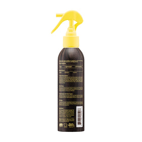 Sun Bum sea spray next to travel items showing compact 6 fl oz convenience