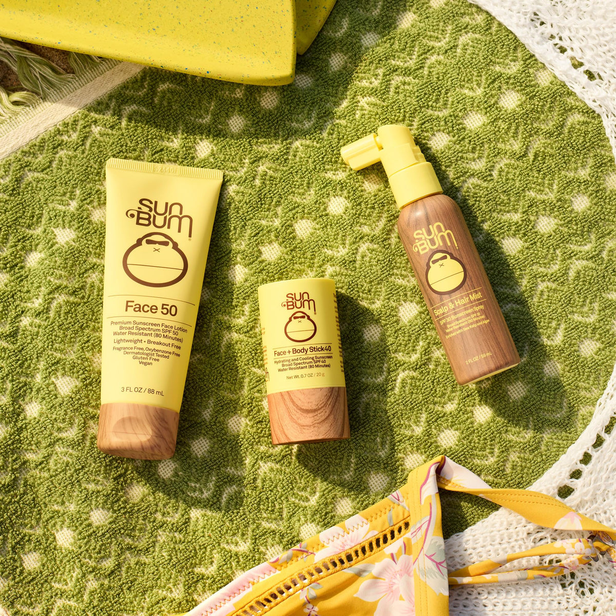 Sun Bum 2 oz bottle next to a passport for travel-friendly protection