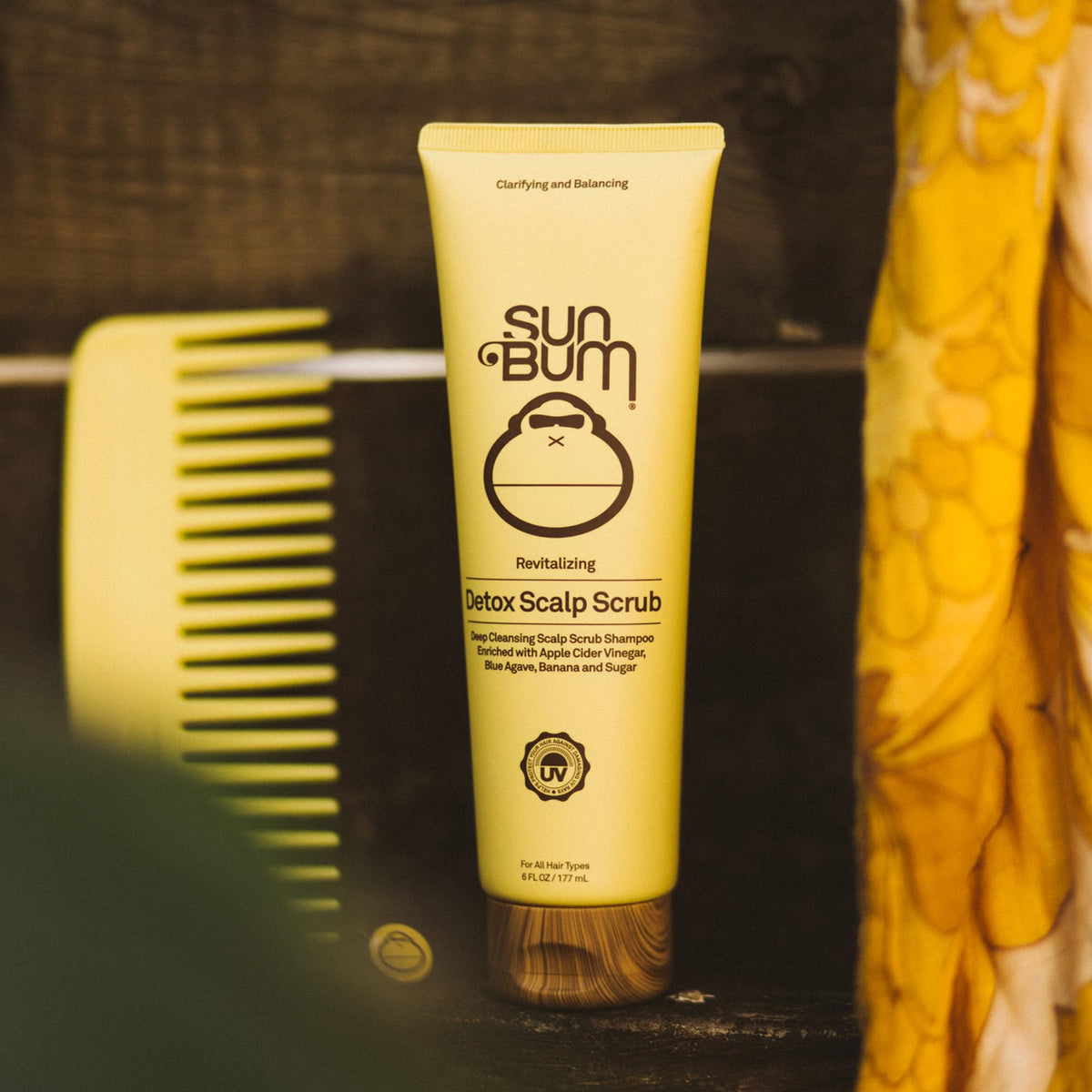 Sun Bum 6 oz tube in hand to show size and travel-friendly convenience