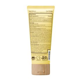 Sun Bum SPF 70 tube on a sandy beach scene illustrating outdoor protection use