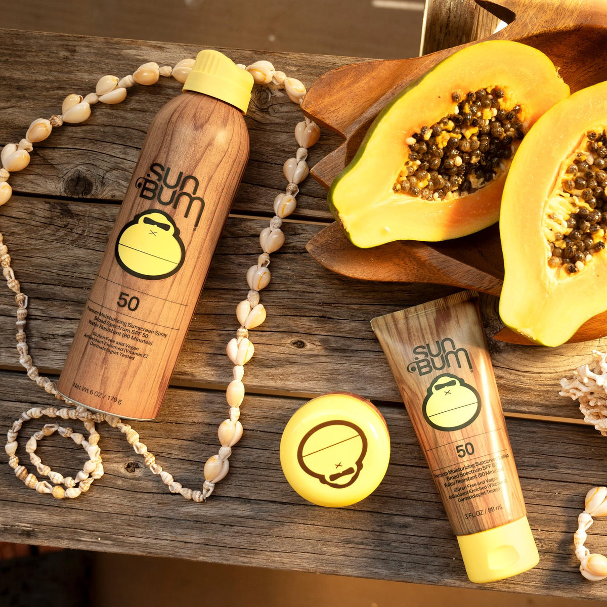 Sun Bum applying clear zinc SPF 50 to face, demonstrates easy absorption and protection