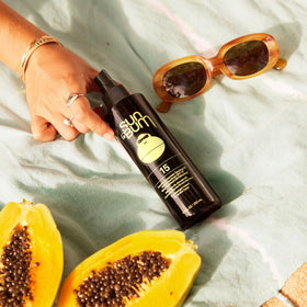 Sun Bum oil texture close-up highlighting lightweight absorbent finish
