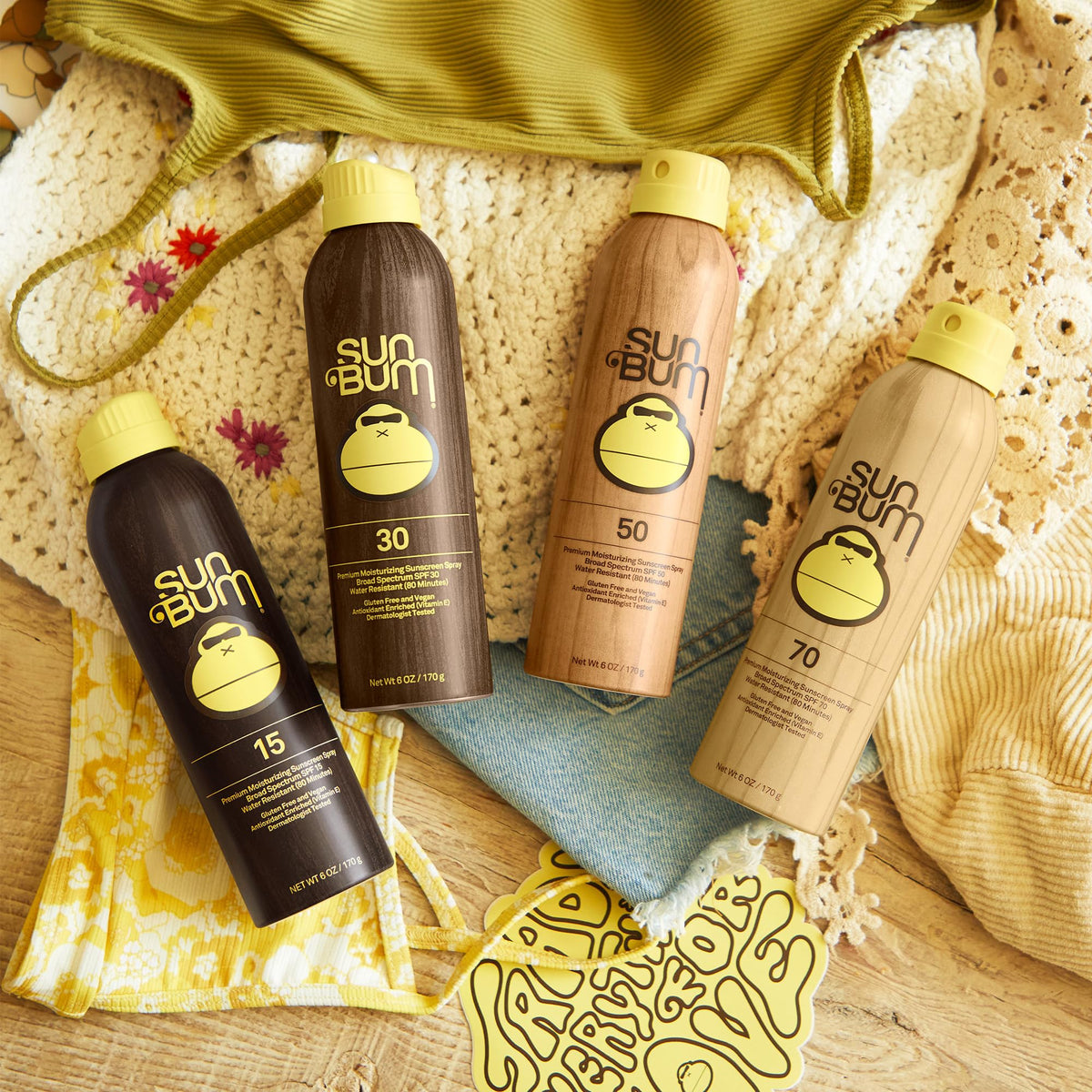 Sun Bum spray mist on hand demonstrating quick-dry texture and moisturizing benefit