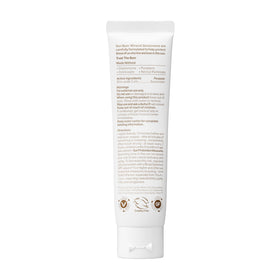 Sun Bum travel-size tube beside passport for convenient portability
