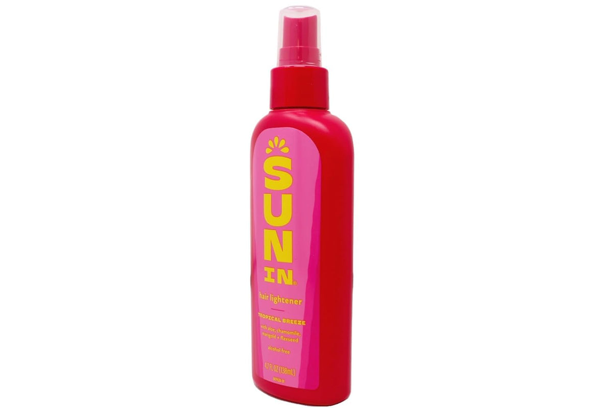 Sun In product on hair strand highlighting texture and shine
