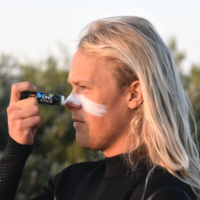 Sun Zapper applied on nose demonstrating visible coverage and protection