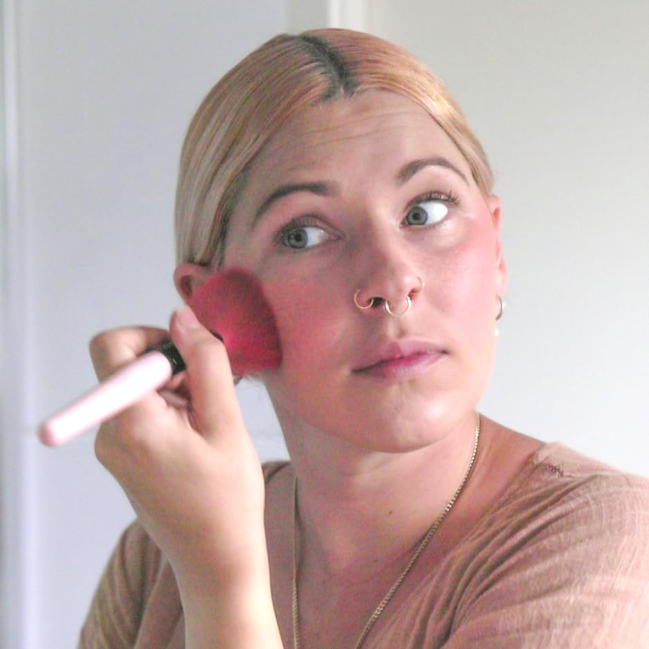Sun Zapper pink blush swipe offering buildable color plus sun protection
