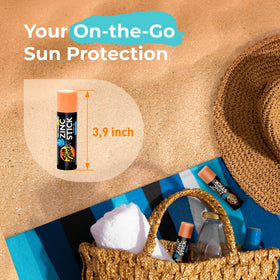 Sun Zapper stick next to sunglasses to show compact travel size