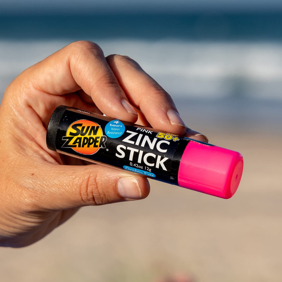 Sun Zapper tucked inside travel bag ready for holiday use and on-the-go reapplication