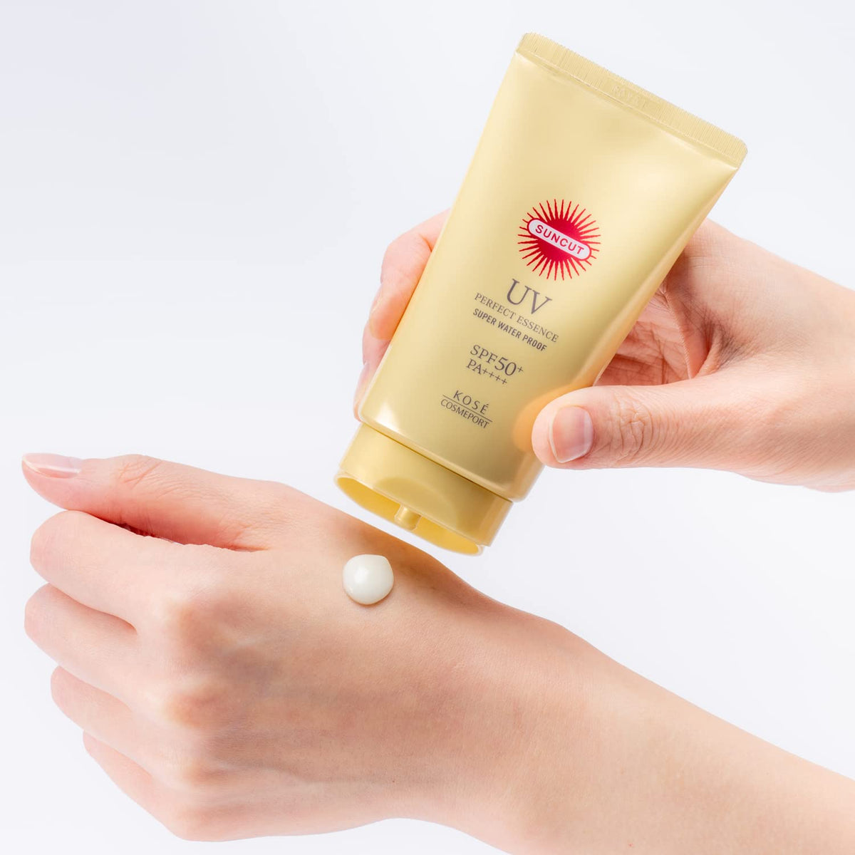 Suncut KOSE essence on fingertip demonstrating easy application