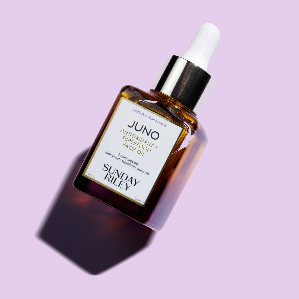 Sunday Riley Juno dropper releasing oil highlighting lightweight texture and fast absorption