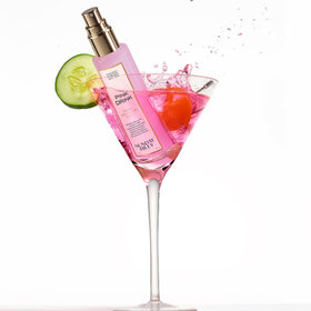 Sunday Riley Pink Drink held in hand to show size and portability