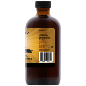 sunny isle bottle beside ingredient list showing roasted seed authenticity