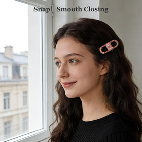 Sunolga clips inside a makeup bag showing travel-ready styling aid