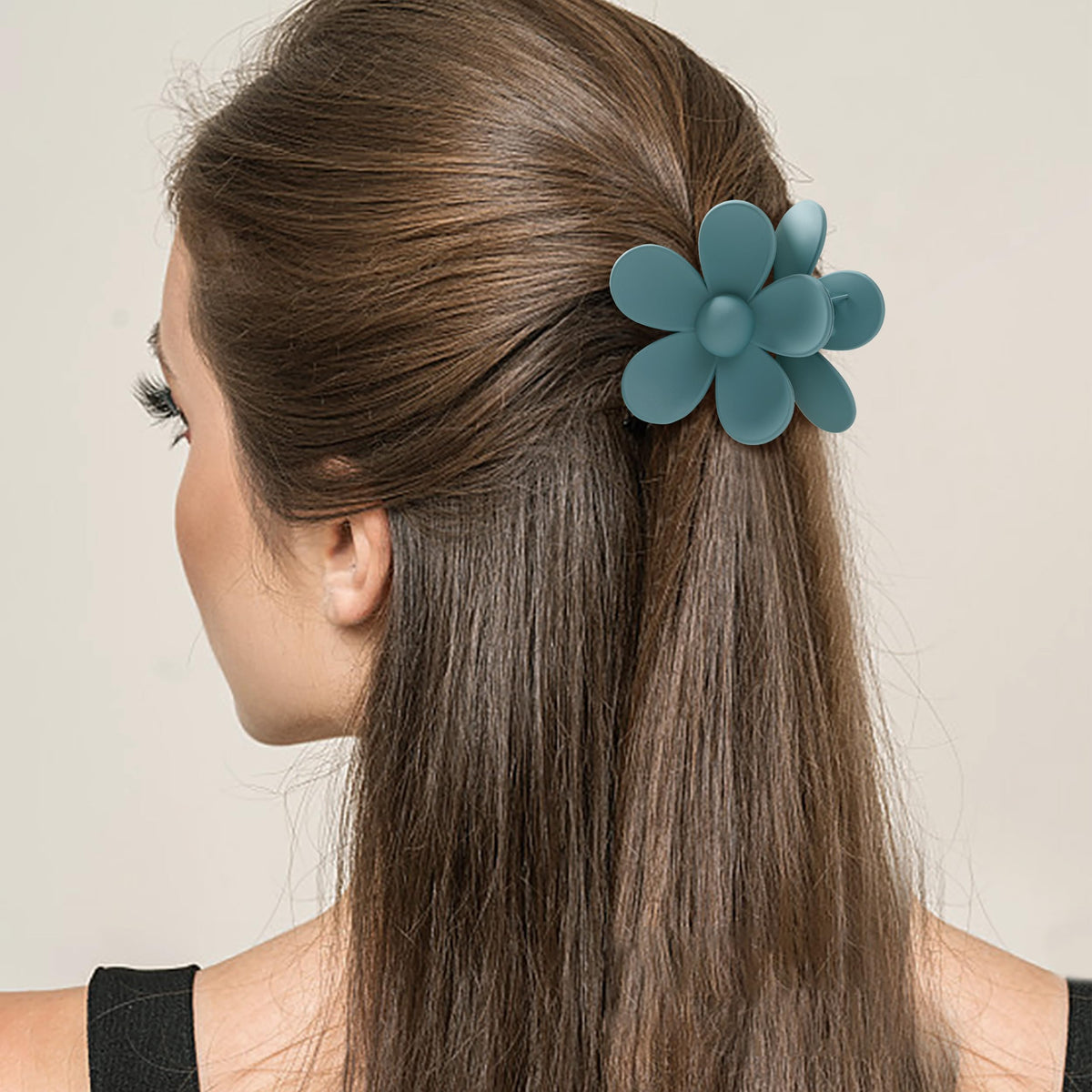 Sunolga clip holding a high bun demonstrating strong hold for thick hair