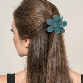 Sunolga clip holding a high bun demonstrating strong hold for thick hair