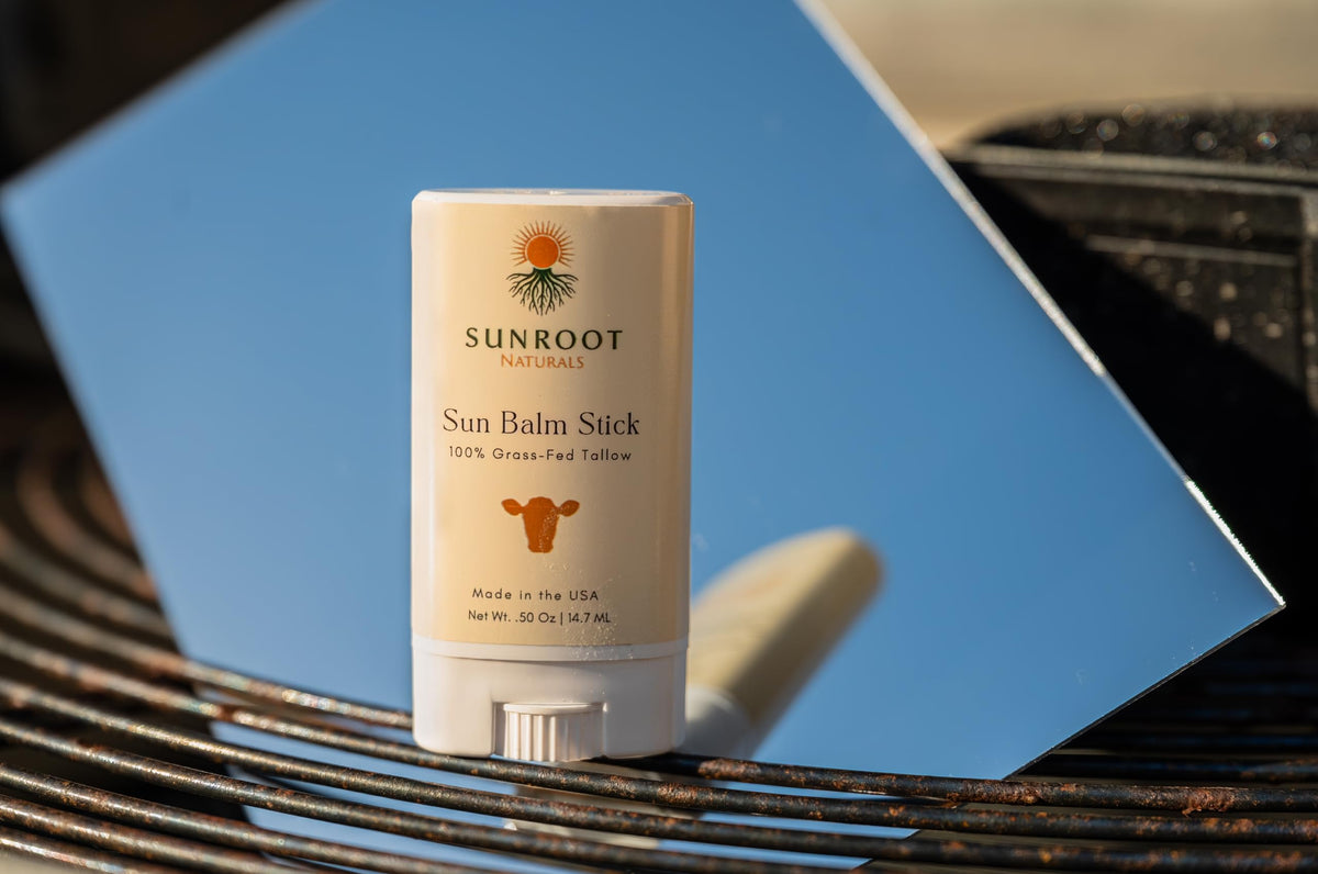 Sunroot Naturals sun stick in beach setting demonstrating outdoor use