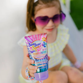 Sunshine & Glitter label close-up showing ingredient highlights and vegan claim