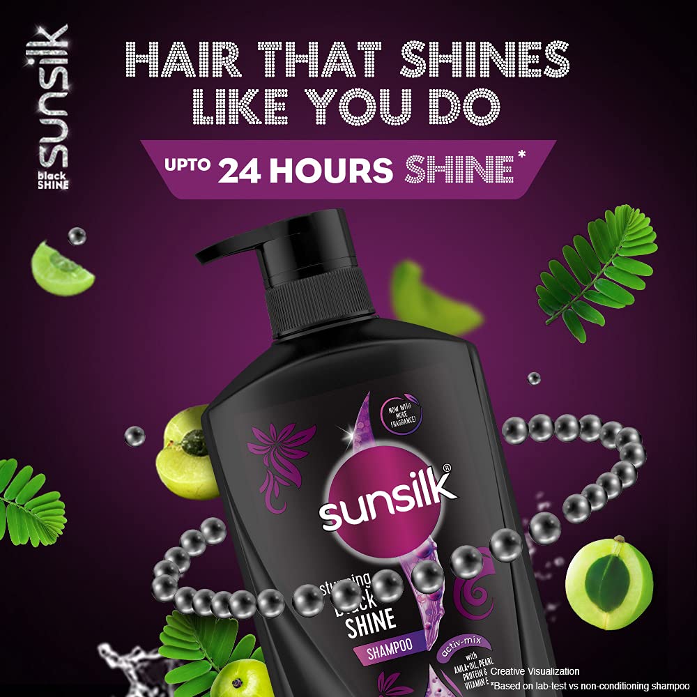 sunsilk lifestyle shot on black-haired model outdoors showing natural shine and confidence