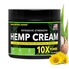 Super Natural Goods hemp cream next to hand for size comparison and portable use