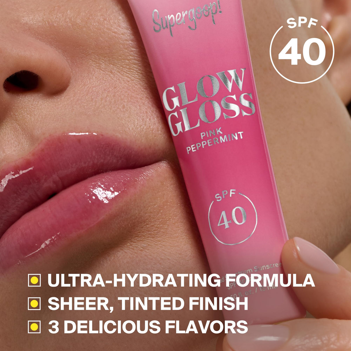 Supergoop! lip gloss beside purse and sunglasses suggesting easy on-the-go reapplication