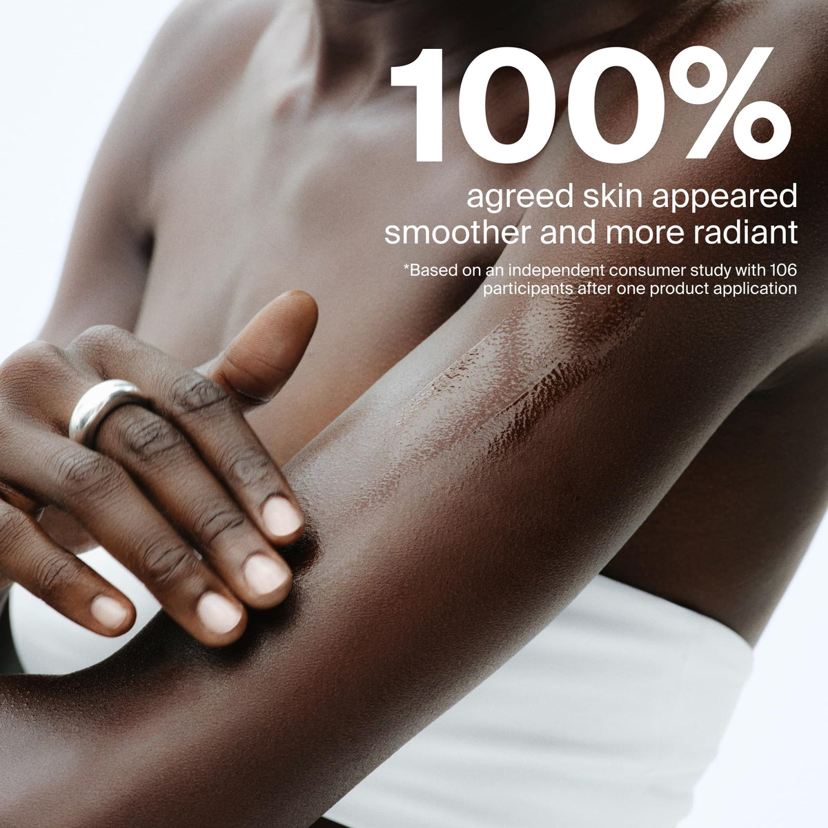 Supergoop! bottle with marigold meadowfoam grape seed ingredient accents