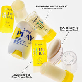 Supergoop! Glow Stick next to hand for size comparison and on-the-go benefit