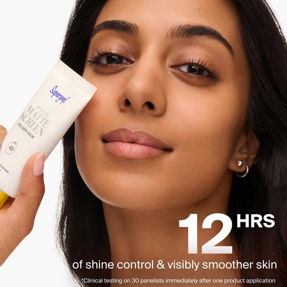 Supergoop! applying with fingers to show easy blend and pore blurring