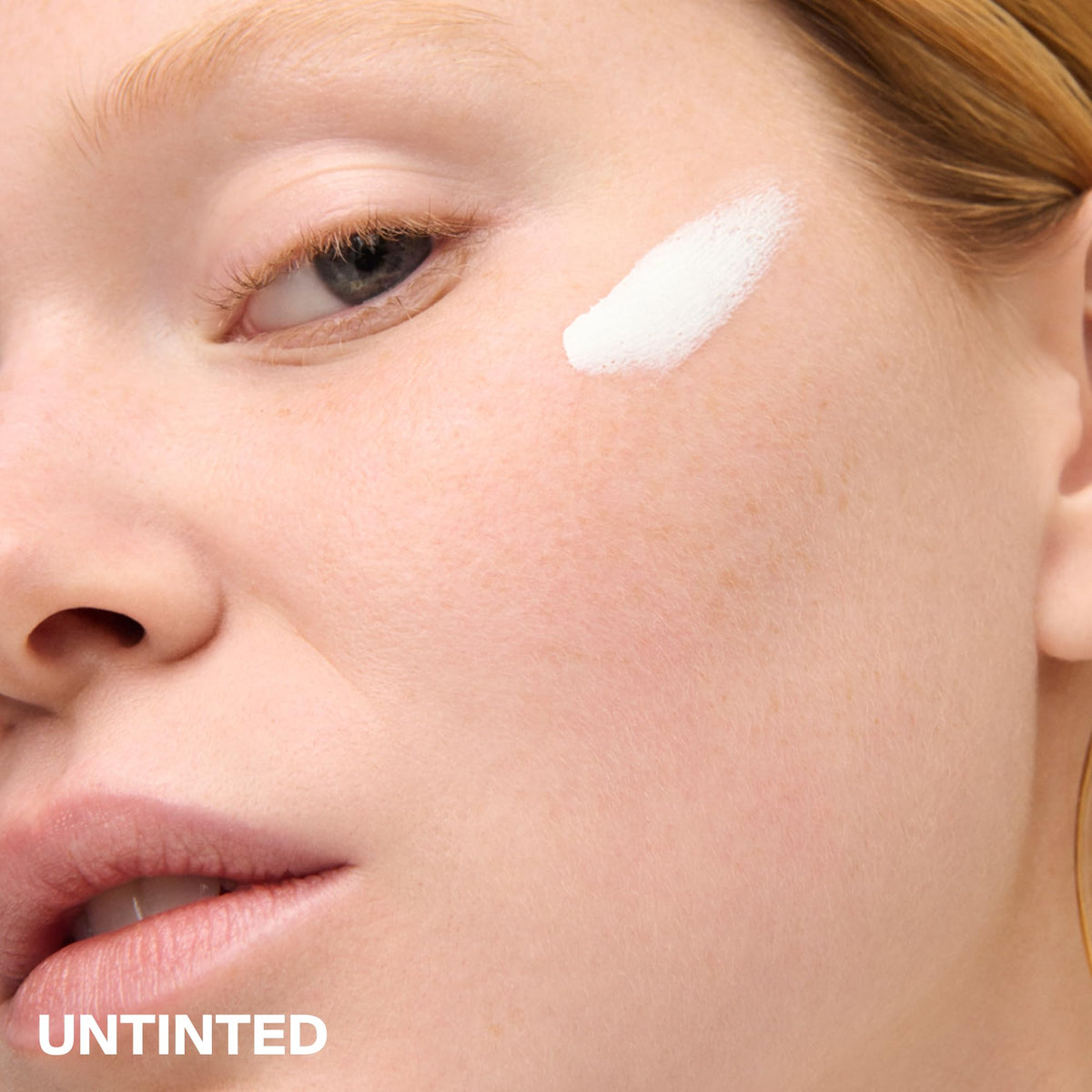 supergoop! neutral tint swatch blending into skin for minimal white cast