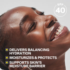 Supergoop! applied on hand illustrating smooth spreadability and hydration