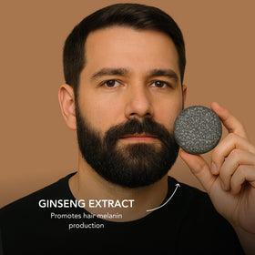 Superior Mane beard shampoo bar held in hand to show real-life size and travel convenience