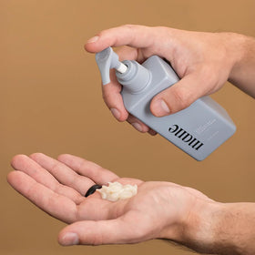 Superior Mane bottle on bath counter suggesting everyday grooming convenience