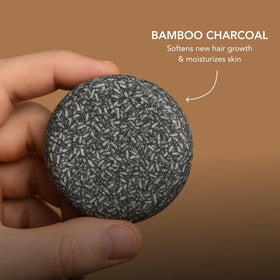 Superior Mane close-up of charcoal-textured bar highlighting purifying ingredient benefits