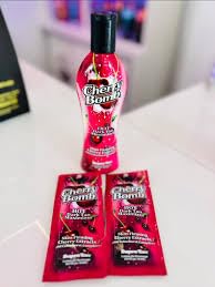 Close-up of Supre Cherry Bomb label listing Vitamins A C E and cherry extracts for skin conditioning