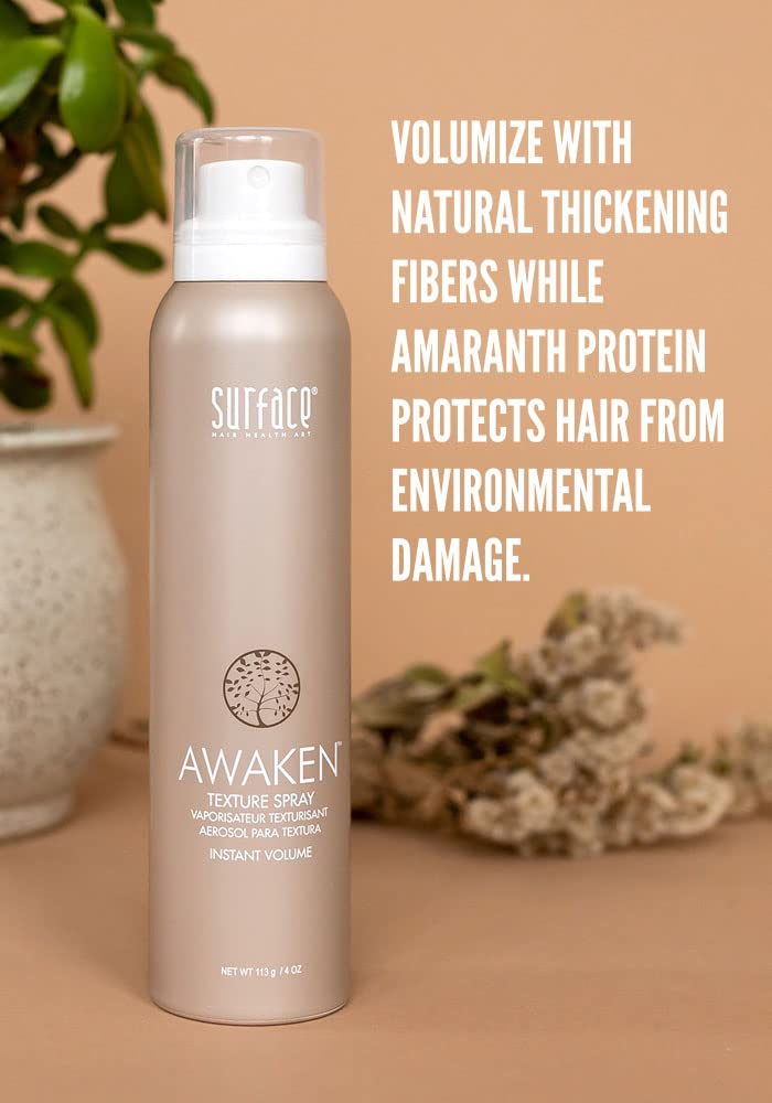 SURFACE spray action misting into hair for instant texture benefit