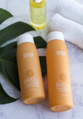 SURFACE Bassu creamy shampoo texture pouring to show hydration and smoothness