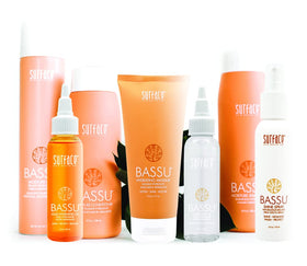 SURFACE Bassu next to ruler showing 10 fl oz bottle scale and travel-friendly size