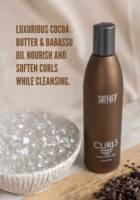 SURFACE rich lather close-up demonstrating moisturizing foam for curls