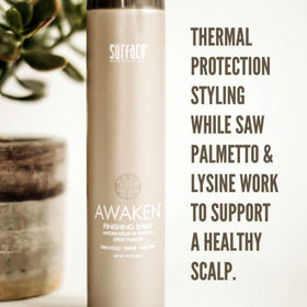 SURFACE dispensing a fine mist onto hair for even coverage and effortless styling