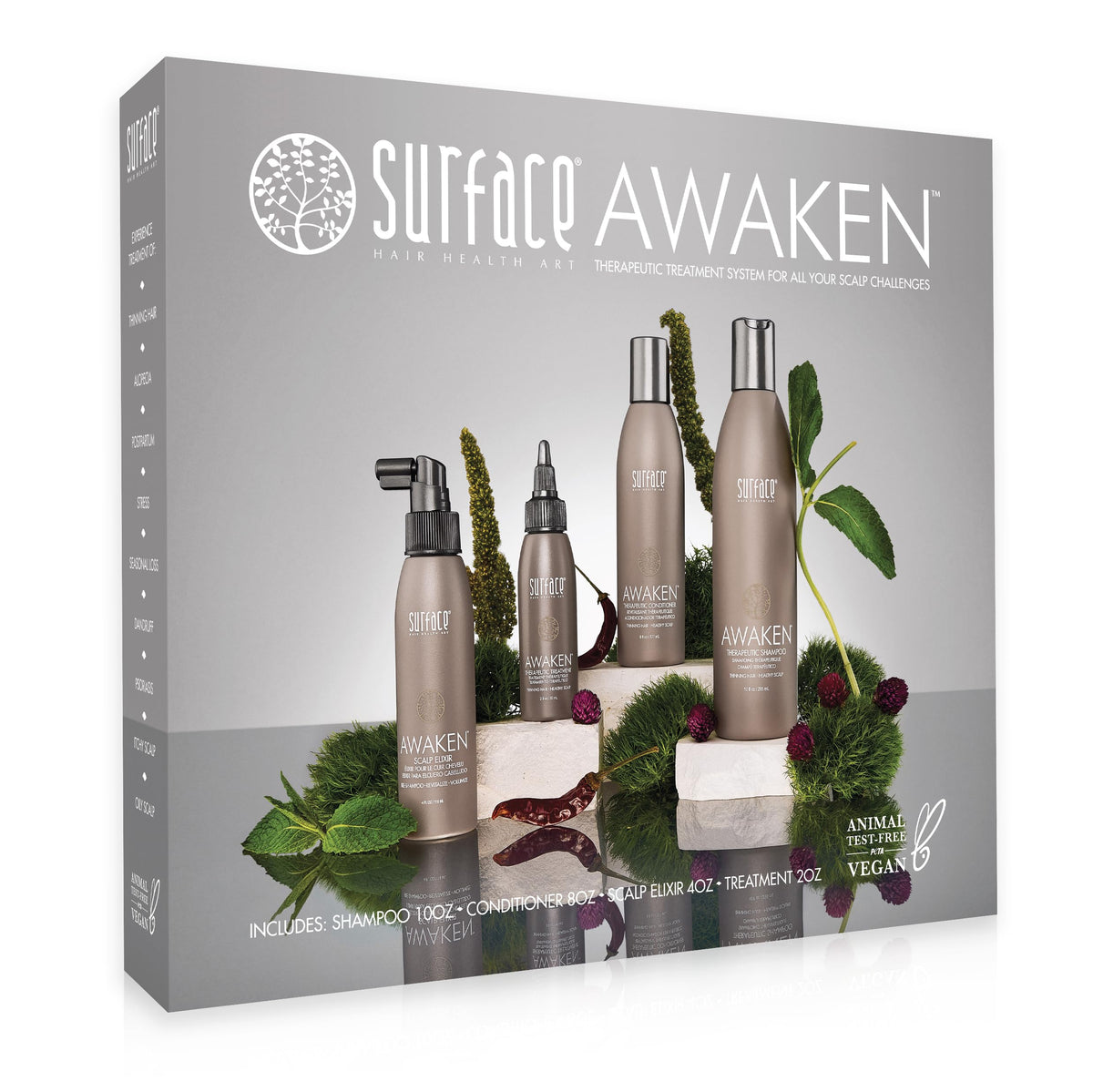 SURFACE scalp elixir dropper in hand for targeted root delivery