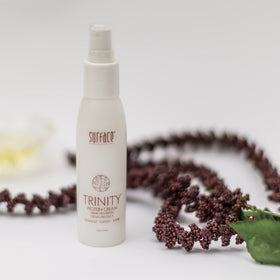 SURFACE Trinity cream in hand size comparison conveys portable convenience