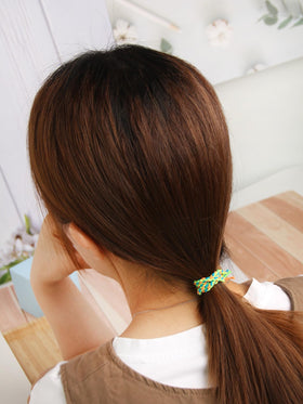 SUSULU hair tie worn as wrist bracelet offering portable styling and quick access