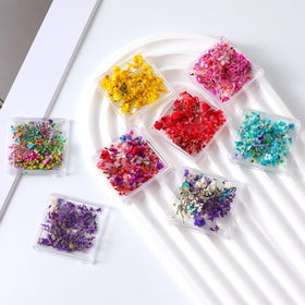 SUTOZMIWE lifestyle manicure setting with flowers adding natural accents and refined look